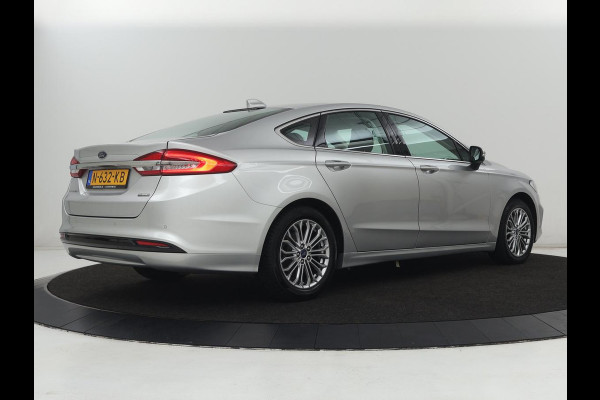 Ford Mondeo 2.0 IVCT HEV Titanium | Stoelverwarming | Carplay | Keyless | Navigatie | Climate control | Parkeerhulp | Cruise control | Bluetooth | DAB | Verwarmde voorruit