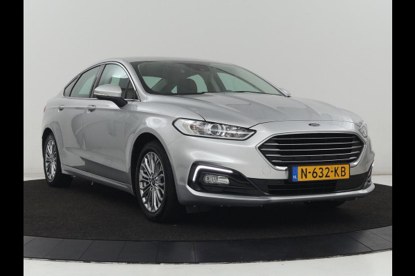 Ford Mondeo 2.0 IVCT HEV Titanium | Stoelverwarming | Carplay | Keyless | Navigatie | Climate control | Parkeerhulp | Cruise control | Bluetooth | DAB | Verwarmde voorruit