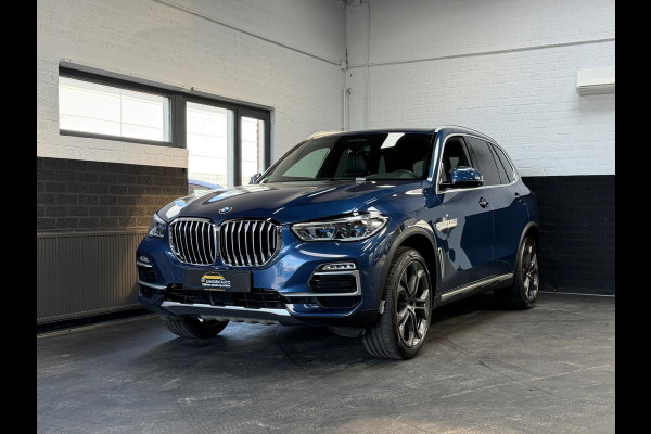BMW X5 XDrive40i High Executive | H&K | Luchtvering | 21 inch | Multicontour stoelen | HUD | Luchtvering