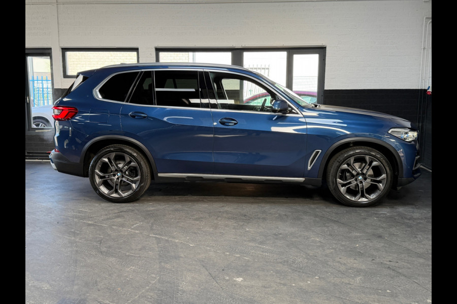 BMW X5 XDrive40i High Executive | H&K | Luchtvering | 21 inch | Multicontour stoelen | HUD | Luchtvering