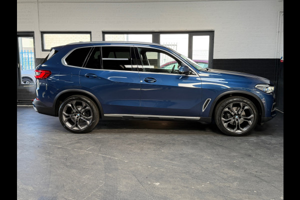 BMW X5 XDrive40i High Executive | H&K | Luchtvering | 21 inch | Multicontour stoelen | HUD | Luchtvering