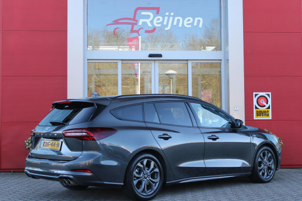 Ford FOCUS Wagon 1.0 155PK AUTOMAAT Hybrid ST LINE | ALL SEASON BANDEN | NAVIGATIE | DRAADLOZE APPLE CARPLAY/ANDROID AUTO | ADAPTIVE CRUISE CONTROL | LANE ASSIST | DODEHOEK DETECTIE | PARKEERSENSOREN VOOR + ACHTER | ACHTERUITRIJ CAMERA | LICHTMETALEN VELGEN 17" | DAB+ RADIO |