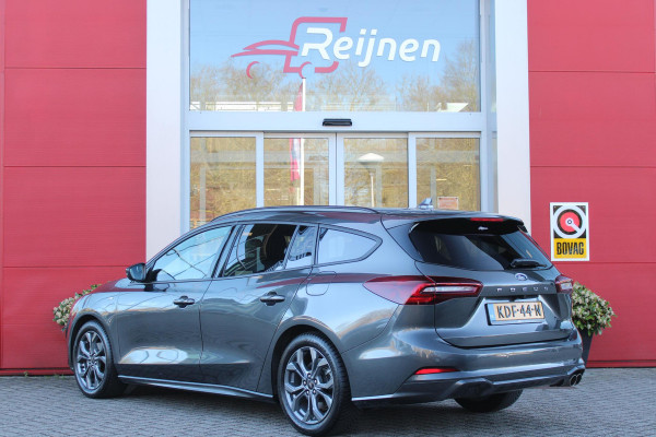 Ford FOCUS Wagon 1.0 155PK AUTOMAAT Hybrid ST LINE | ALL SEASON BANDEN | NAVIGATIE | DRAADLOZE APPLE CARPLAY/ANDROID AUTO | ADAPTIVE CRUISE CONTROL | LANE ASSIST | DODEHOEK DETECTIE | PARKEERSENSOREN VOOR + ACHTER | ACHTERUITRIJ CAMERA | LICHTMETALEN VELGEN 17" | DAB+ RADIO |