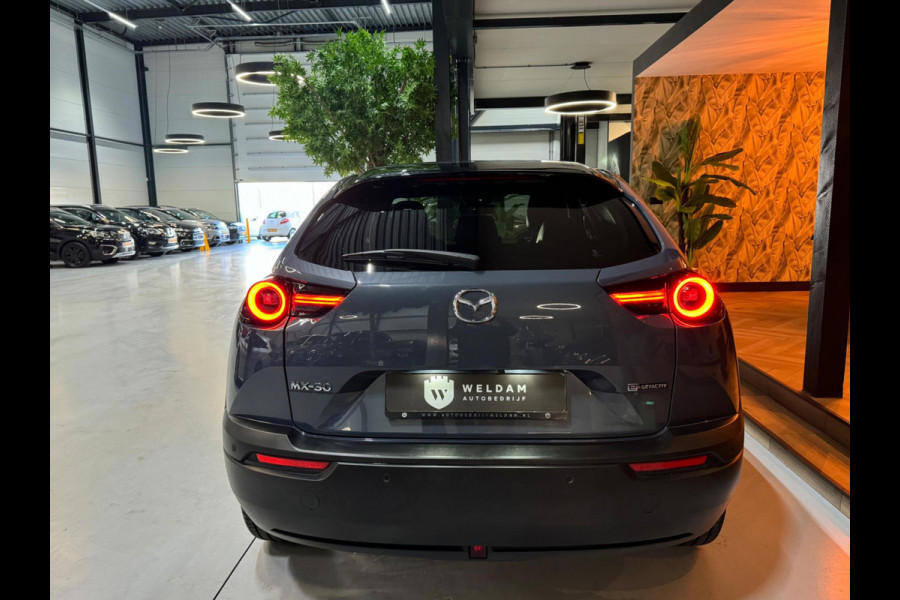 Mazda MX-30 E-SkyActiv 145 First Edition 36 kWh Garantie NAP Memory Camera StoelVW Dodehoek PDC ACC DAB Clima Navi Rijklaar