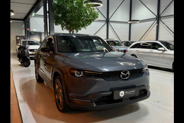 Mazda MX-30 E-SkyActiv 145 First Edition 36 kWh Garantie NAP Memory Camera StoelVW Dodehoek PDC ACC DAB Clima Navi Rijklaar