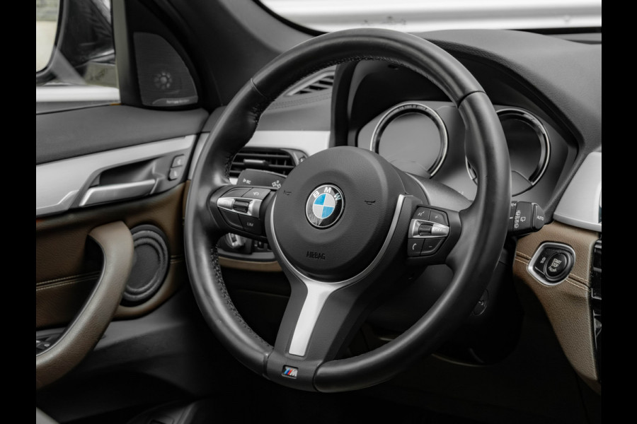 BMW X1 sDrive20i M-Sport - Pano - Trekhaak - Memoryzetel - Camera - Harman Kardon