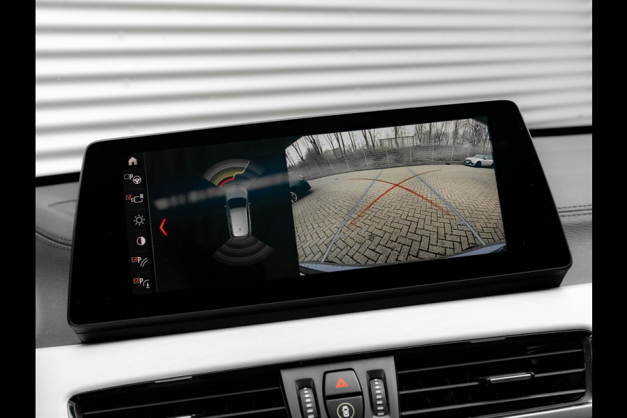 BMW X1 sDrive20i M-Sport - Pano - Trekhaak - Memoryzetel - Camera - Harman Kardon
