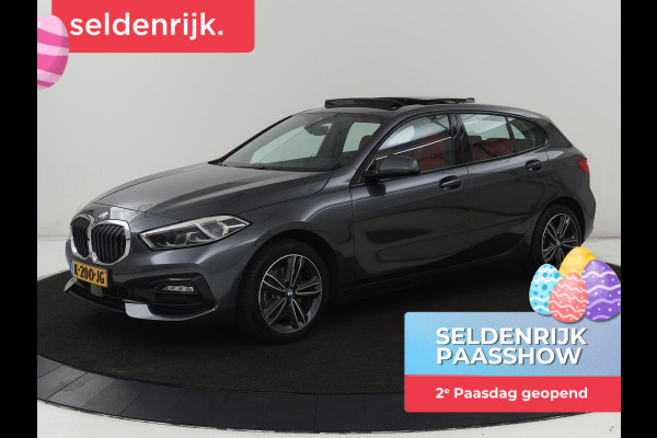 BMW 1-serie 118i High Executive | Sport Line | Panoramadak | Leder | Stoelverwarming | Keyless | Live Cockpit | Carplay | Sportstoelen | Navigatie | Spiegel Pakket | Parkeerhulp | Climate control