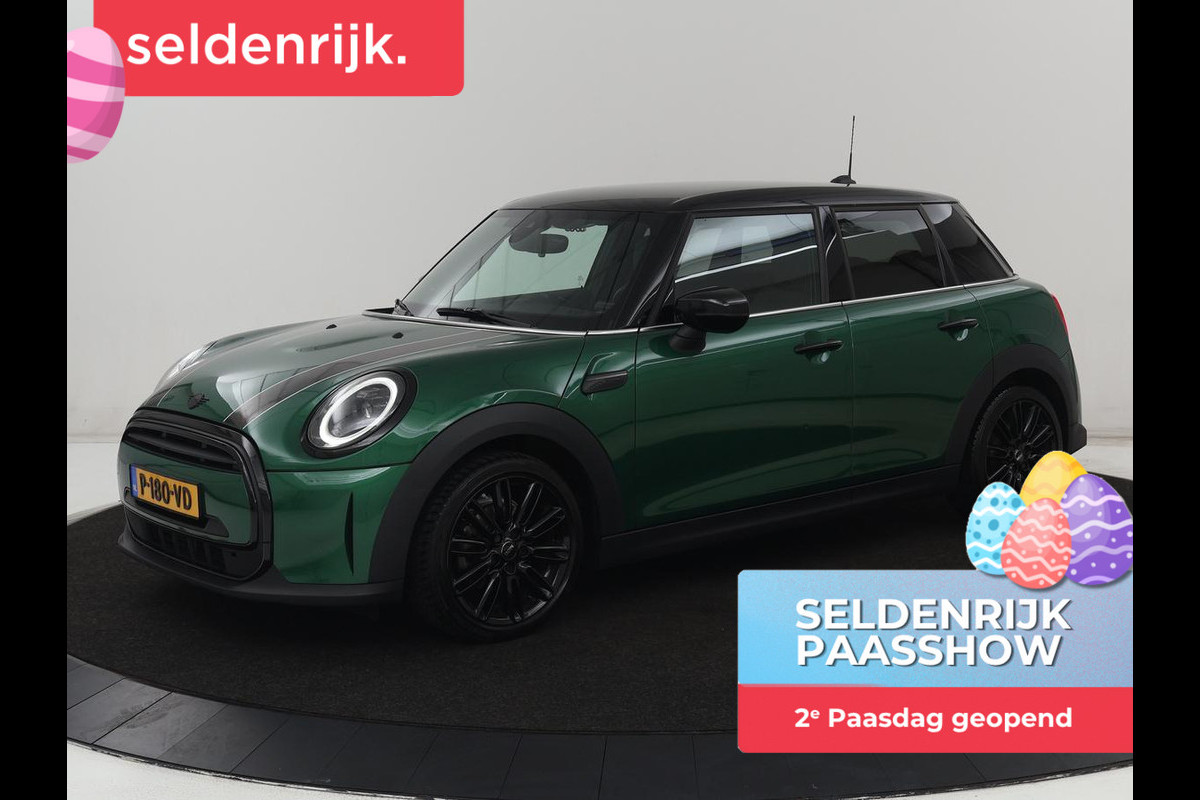 MINI Cooper 1.5 Business Edition | Harman/Kardon | Carplay | Verwarmde voorruit | Navigatie | Full LED | Half leder | Parkeerhulp | Climate control | Cruise control | Bluetooth | British Racing Green