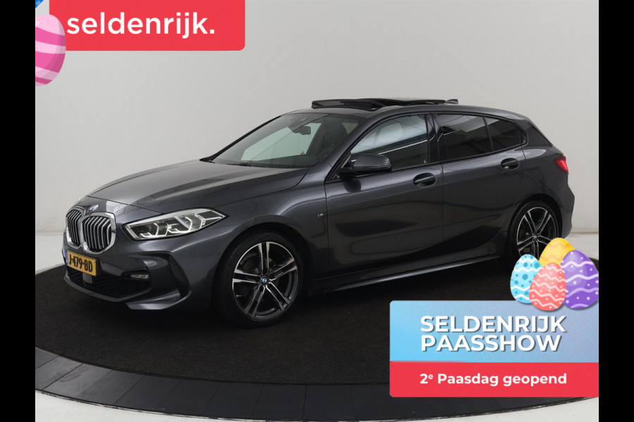 BMW 1-serie 118i M Sport | Panoramadak | Stoelverwarming | Harman/Kardon | Camera | Live Cockpit | Carplay | Sfeerverlichting | Sportstoelen | Full LED | Navigatie | Half leder | Park Assist | Climate control