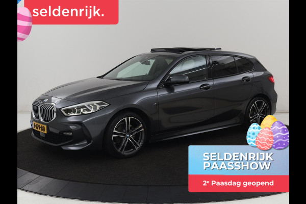 BMW 1-serie 118i M Sport | Panoramadak | Stoelverwarming | Harman/Kardon | Camera | Live Cockpit | Carplay | Sfeerverlichting | Sportstoelen | Full LED | Navigatie | Half leder | Park Assist | Climate control