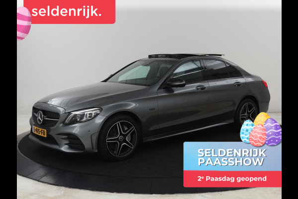 Mercedes-Benz C-Klasse 300e AMG | Panoramadak | 360 Camera | Stoelverwarming | Leder/Alcantara | Carplay | Sfeerverlichting | Park Assist | Navigatie | Full LED | PHEV | Plug In