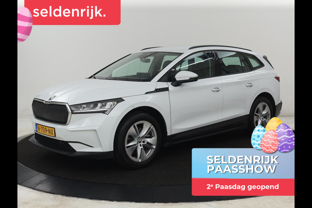 Škoda ENYAQ iV 60 | SOH 92% | Trekhaak | Half leder | Sfeerverlichting | Carplay | Navigatie | 19'' | Cruise control | Parkeerhulp | Full LED