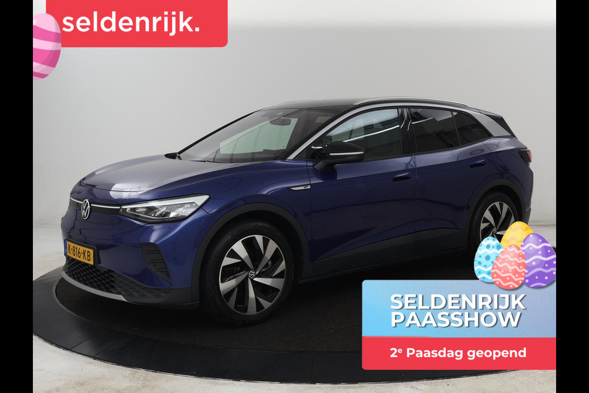 Volkswagen ID.4 First 77 kWh | SOH 90% | Stoel & stuurverwarming | Adaptive cruise | Camera | Carplay | Half leder | Navigatie | 20'' | Full LED | Keyless | Climate control | Sfeerverlichting