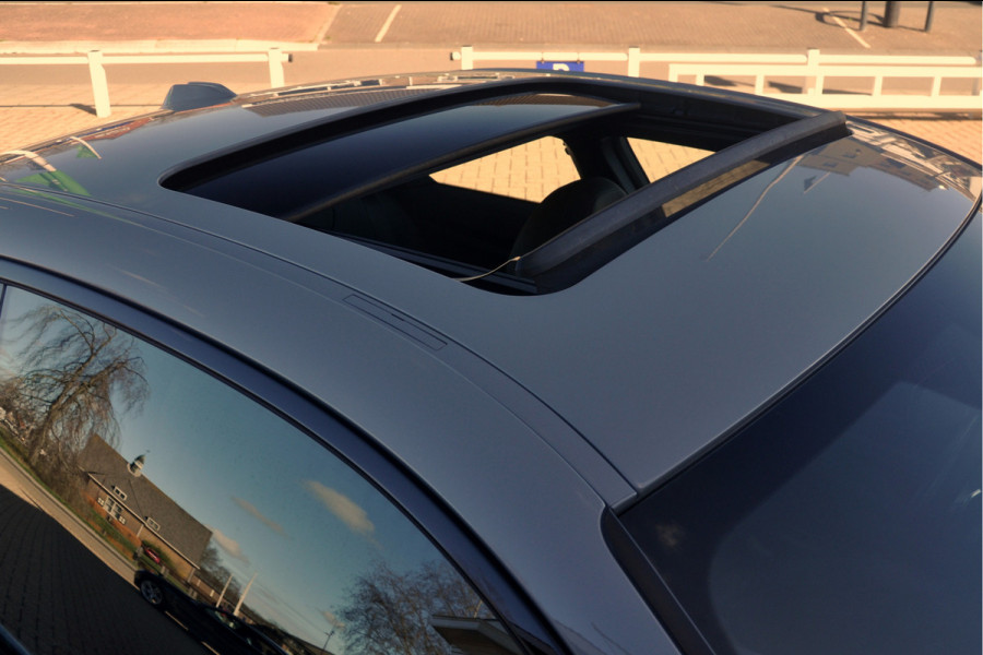 BMW 2 Serie Coupé 220i High Executive | Brooklyn Grey | Schuifdak