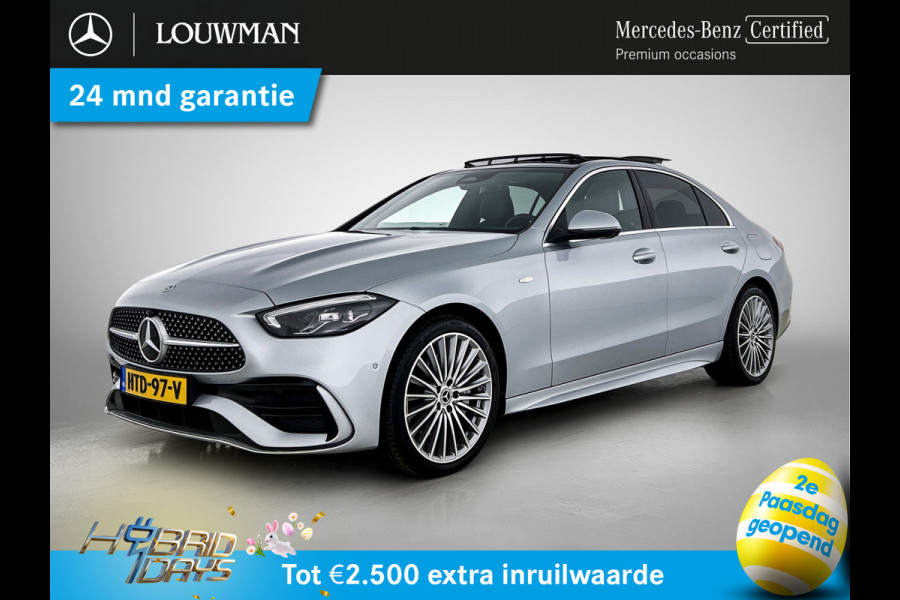 Mercedes-Benz C-Klasse 300 e Business Solution AMG AMG Line | Panorama Schuif-Kanteldak | Distronic | Lederen bekleding | Alarm | Parkeerpakket met 360°-camera | 20 Inch AMG Velgen. Inclusief 24 maanden Mercedes-Benz Certified garantie voor Europa.