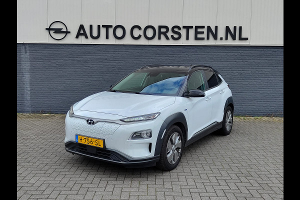 Hyundai Kona EV 64kWh 204pk SOH 100% Leer Premium Schuif-/Kanteldak Warmtepomp Head-Up Display Apple Carplay Android Navi Camera Elektr.Stoel Pdc Subwoofer Bluetooth Dodehoek detector Privacy Glas Rijstrooksensor 1e Eigenaar Origineel Nederlandse Auto Volledig Dealeronderhouden