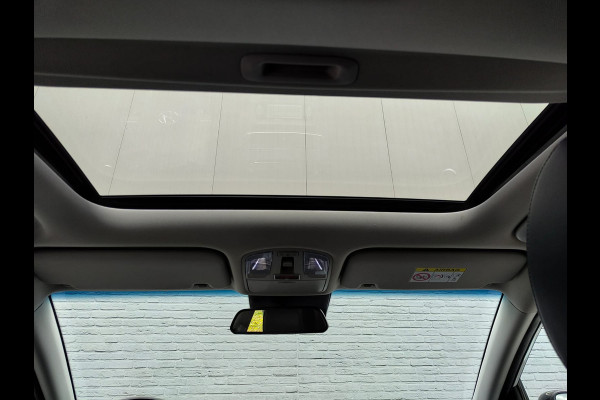 Hyundai Kona EV 64kWh 204pk SOH 100% Leer Premium Schuif-/Kanteldak Warmtepomp Head-Up Display Apple Carplay Android Navi Camera Elektr.Stoel Pdc Subwoofer Bluetooth Dodehoek detector Privacy Glas Rijstrooksensor 1e Eigenaar Origineel Nederlandse Auto Volledig Dealeronderhouden