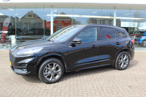 Ford Kuga 2.5-225pk Plug-in Hybrid ST-Line X. Hybride rijden voor een reële prijs ! Adaptive Cruise Control, Stoel- en voorraamverwarming, Climate Control, Metallic lak, Camera v+a, Elektr. achterklep, Side- en lane assist etc.