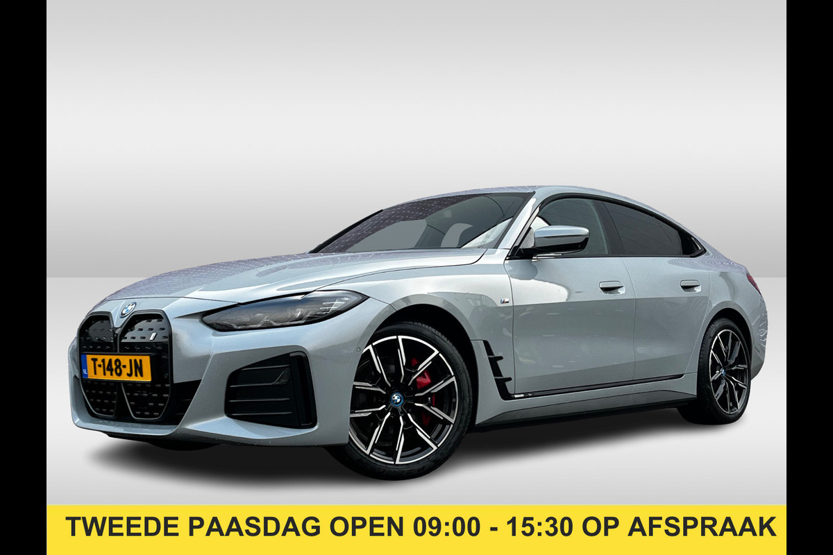 BMW i4 eDrive40 High Executive 84 kWh / Trekhaak / 360Camera / Head-up / Leder / 19'' / Navigatie / Stoelverwarming / DAB / Cruise Control