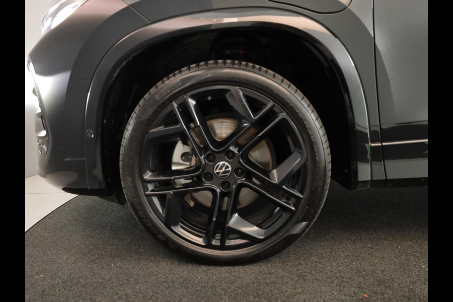Volkswagen Tayron 1.5 eHybrid R-Line Edition 272 pk Automaat (DSG) | Verlengde garantie | Navigatie | Panoramadak | Trekhaak (wegklapbaar) | Rondomzicht camera | Lederen bekleding | Stoelverwarming v/a | R-Line |