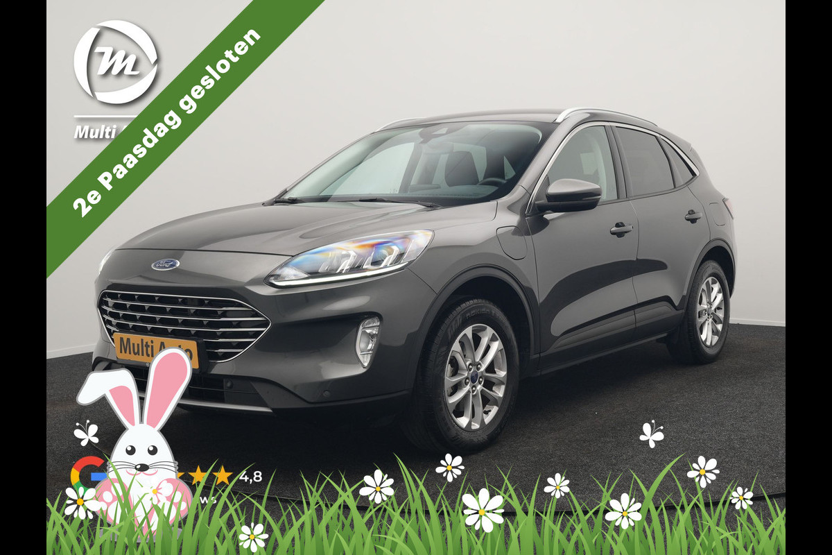 Ford Kuga 2.5 Titanium PHEV 225pk Dealer O.H. | Trekhaak Afn. | Camera | Stoelen & Stuur Verwarmd | Keyless | Apple Carplay | Virtual | Navigatie | DAB | Cruise Control | Plug In Hybrid |