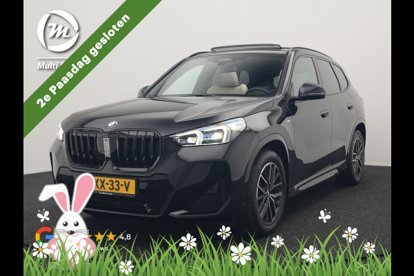 BMW X1 sDrive20i M Sport 156pk Dealer O.H. | Panodak | Lederen Sportstoelen Verwarmd | Adaptive M Onderstel | Widescreen Navi | Camera | Keyless | Adaptive LED | Sfeerverlichting | Apple Carplay | Navigatie | DAB |