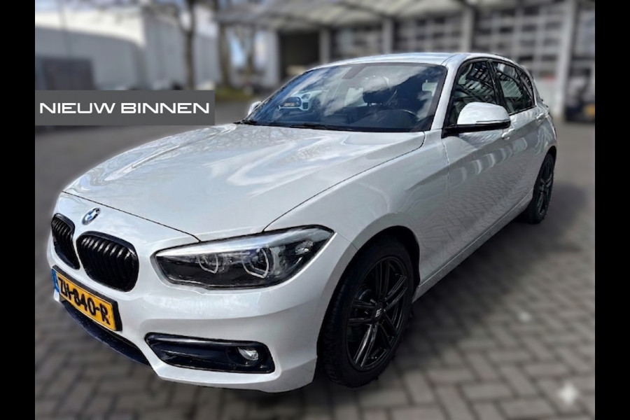 BMW 1-serie 118i Sport Line Edition | Stoelverwarming | Cruise Control | Parkeersensoren | Navigatie | Groot Scherm | Digitale Tellers | Automaat | Keyless | Trekhaak | LED