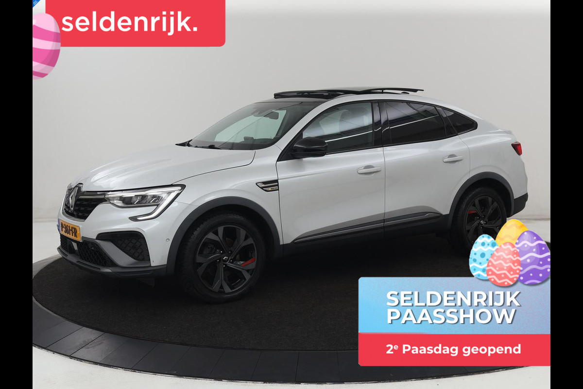 Renault Arkana 1.6 E-Tech Hybrid 145 R.S. Line | Panoramadak | Leder/Alcantara | Trekhaak | Stoelverwarming | Adaptive cruise | Camera | Carplay | Keyless | Park Assist | Full LED | Navigatie | Stuurverwarming