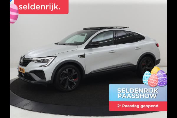 Renault Arkana 1.6 E-Tech Hybrid 145 R.S. Line | Panoramadak | Leder/Alcantara | Trekhaak | Stoelverwarming | Adaptive cruise | Camera | Carplay | Keyless | Park Assist | Full LED | Navigatie | Stuurverwarming