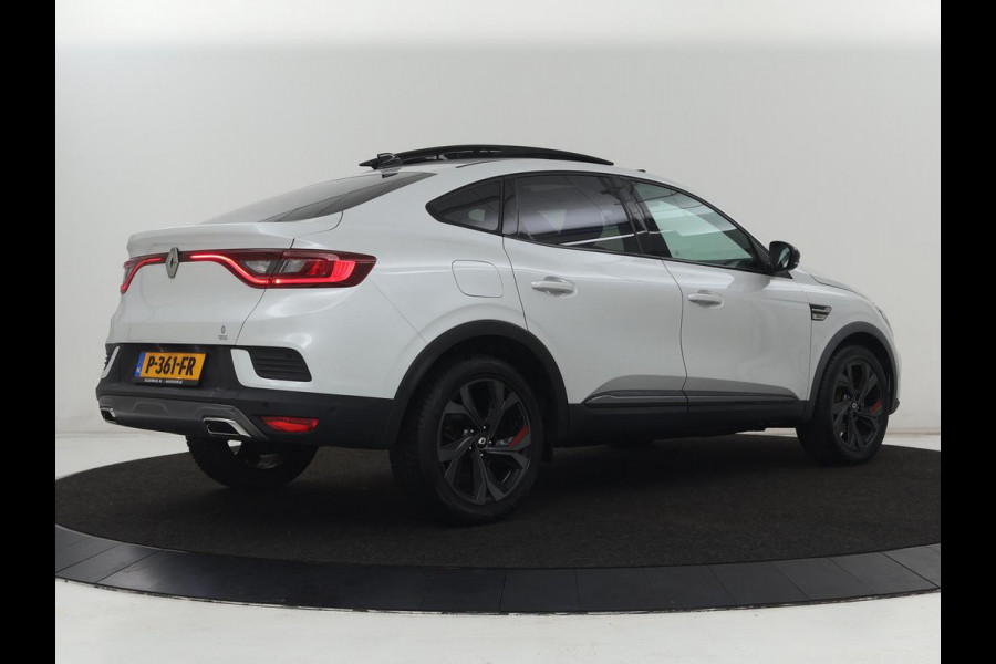 Renault Arkana 1.6 E-Tech Hybrid 145 R.S. Line | Panoramadak | Leder/Alcantara | Trekhaak | Stoelverwarming | Adaptive cruise | Camera | Carplay | Keyless | Park Assist | Full LED | Navigatie | Stuurverwarming