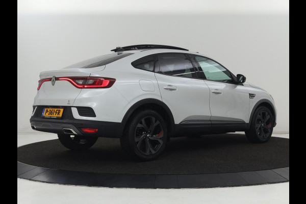 Renault Arkana 1.6 E-Tech Hybrid 145 R.S. Line | Panoramadak | Leder/Alcantara | Trekhaak | Stoelverwarming | Adaptive cruise | Camera | Carplay | Keyless | Park Assist | Full LED | Navigatie | Stuurverwarming