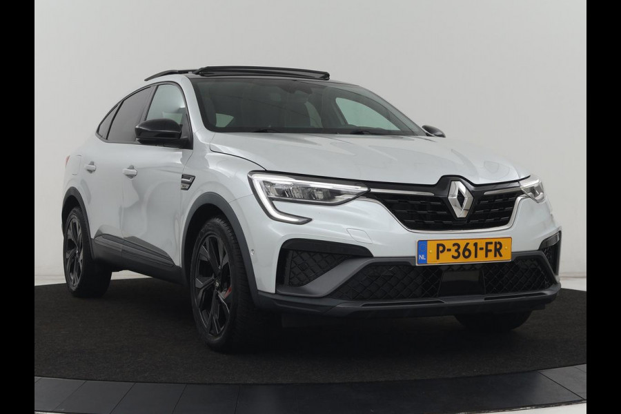 Renault Arkana 1.6 E-Tech Hybrid 145 R.S. Line | Panoramadak | Leder/Alcantara | Trekhaak | Stoelverwarming | Adaptive cruise | Camera | Carplay | Keyless | Park Assist | Full LED | Navigatie | Stuurverwarming