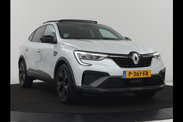 Renault Arkana 1.6 E-Tech Hybrid 145 R.S. Line | Panoramadak | Leder/Alcantara | Trekhaak | Stoelverwarming | Adaptive cruise | Camera | Carplay | Keyless | Park Assist | Full LED | Navigatie | Stuurverwarming