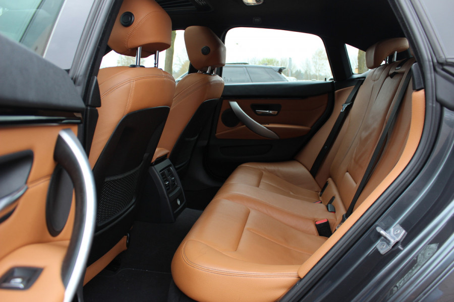 BMW 4 Serie Gran Coupé 418i High Exe. M Sport / Trekhaak / Schuifdak / 360Camera / 18'' / Navigatie / Dodehoek / DAB / Cruise Control / Getint glas / Stoelverwarming