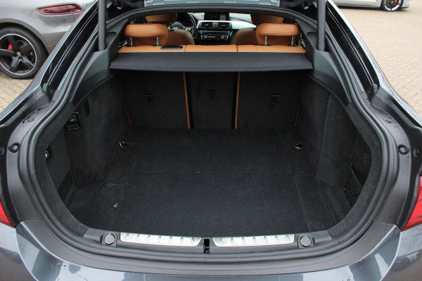 BMW 4 Serie Gran Coupé 418i High Exe. M Sport / Trekhaak / Schuifdak / 360Camera / 18'' / Navigatie / Dodehoek / DAB / Cruise Control / Getint glas / Stoelverwarming