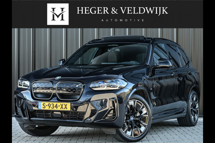 BMW iX3 High Executive 80 kWh M-Sport | Soh 100% | Facelift | Panoramadak | Comfort access | Trekhaak | Shadow-line | Sport seats | Active cruise | 360 camera | Head-up | Harman/Kardon