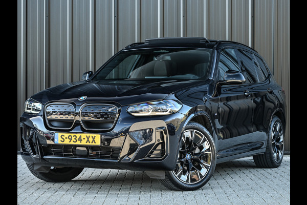 BMW iX3 High Executive 80 kWh M-Sport | Soh 100% | Facelift | Panoramadak | Comfort access | Trekhaak | Shadow-line | Sport seats | Active cruise | 360 camera | Head-up | Harman/Kardon