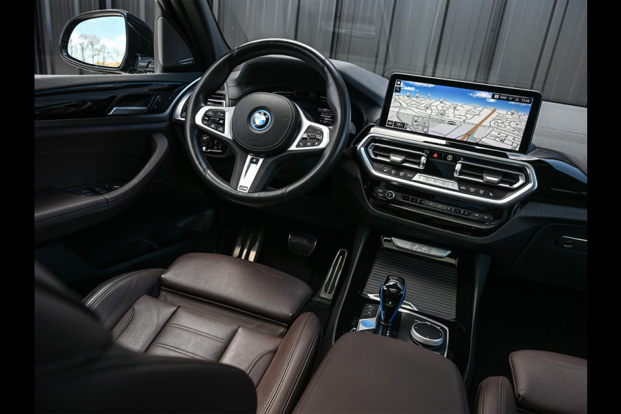 BMW iX3 High Executive 80 kWh M-Sport | Soh 100% | Facelift | Panoramadak | Comfort access | Trekhaak | Shadow-line | Sport seats | Active cruise | 360 camera | Head-up | Harman/Kardon