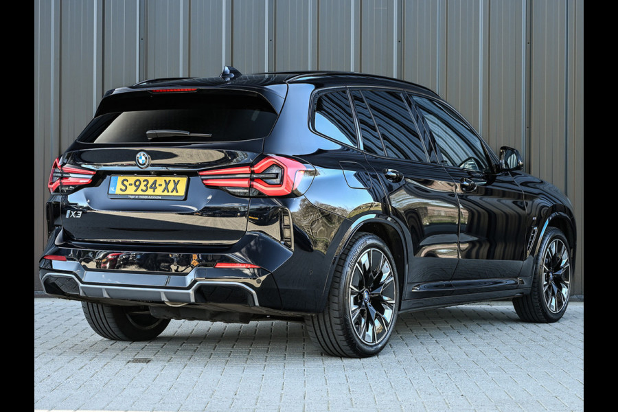 BMW iX3 High Executive 80 kWh M-Sport | Soh 100% | Facelift | Panoramadak | Comfort access | Trekhaak | Shadow-line | Sport seats | Active cruise | 360 camera | Head-up | Harman/Kardon