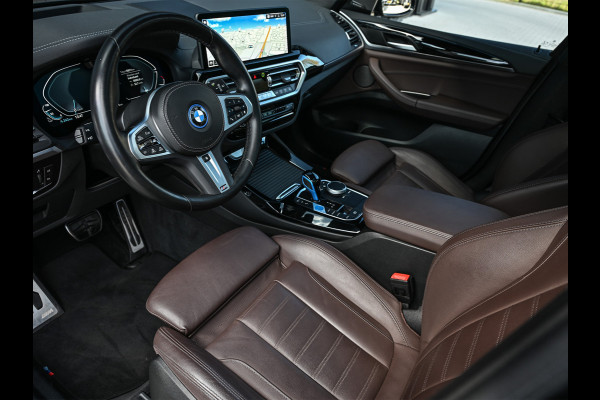 BMW iX3 High Executive 80 kWh M-Sport | Soh 100% | Facelift | Panoramadak | Comfort access | Trekhaak | Shadow-line | Sport seats | Active cruise | 360 camera | Head-up | Harman/Kardon