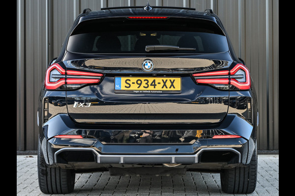 BMW iX3 High Executive 80 kWh M-Sport | Soh 100% | Facelift | Panoramadak | Comfort access | Trekhaak | Shadow-line | Sport seats | Active cruise | 360 camera | Head-up | Harman/Kardon