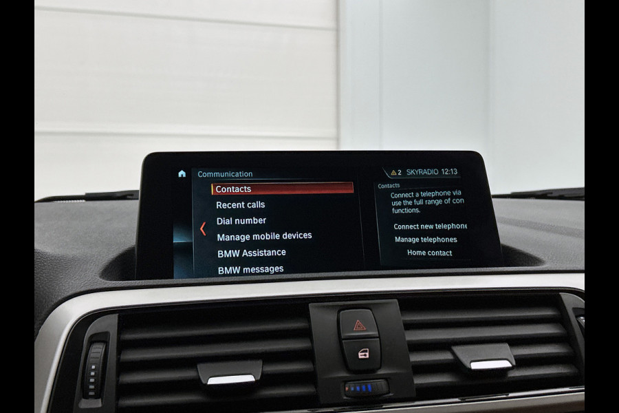 BMW 1-serie 118i High Executive (GROOT-NAVIGATIE, LEDER, STOELVERWARMING, PARKEERSENSOREN, DEALER ONDERHOUDEN)