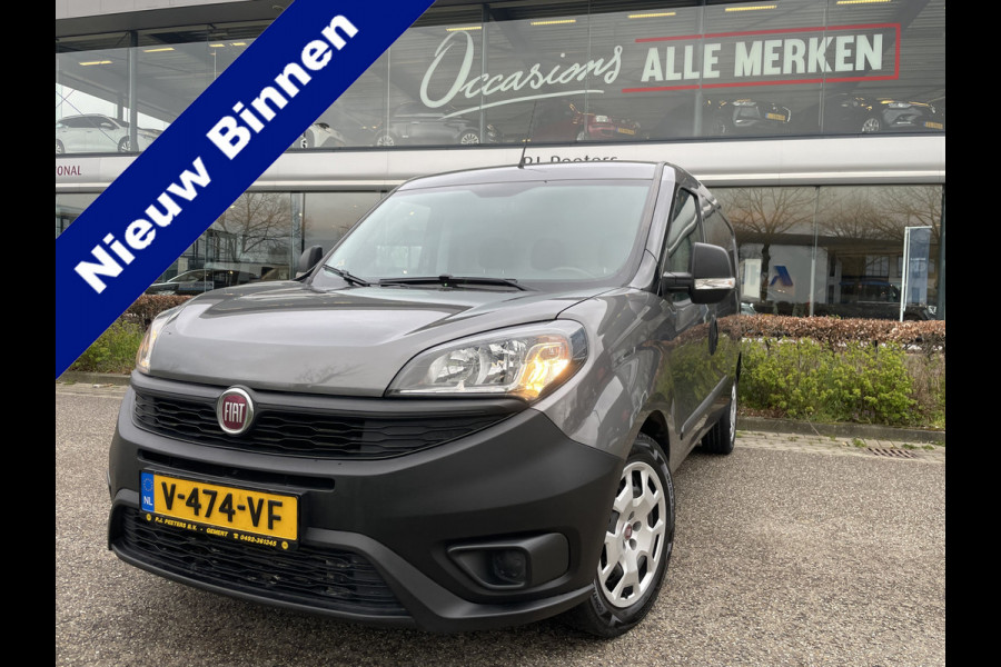 Fiat Doblò Cargo 1.6 MJ L2H1 Maxi Airco - Achteruitrijcamera - Navigatie - Cruise control - 3 zitplaatsen - Zijschuifdeur rechts - Tussenschot volledig - Elektrische ramen voor - Bluetooth - Stuur multifunctioneel - Radio