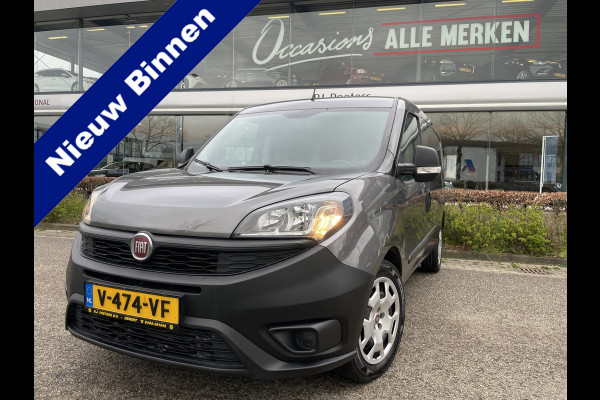 Fiat Doblò Cargo 1.6 MJ L2H1 Maxi Airco - Achteruitrijcamera - Navigatie - Cruise control - 3 zitplaatsen - Zijschuifdeur rechts - Tussenschot volledig - Elektrische ramen voor - Bluetooth - Stuur multifunctioneel - Radio