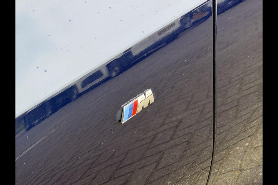 BMW 3 Serie Touring 320i High Executive M-Sport | Panoramadak | Camera | Head-Up Display | DAB |