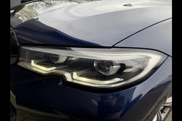 BMW 3 Serie Touring 320i High Executive M-Sport | Panoramadak | Camera | Head-Up Display | DAB |