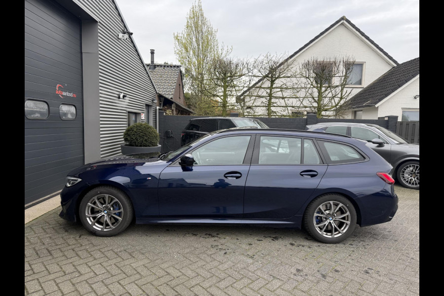 BMW 3 Serie Touring 320i High Executive M-Sport | Panoramadak | Camera | Head-Up Display | DAB |
