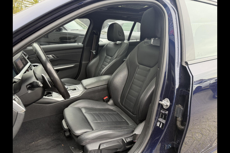 BMW 3 Serie Touring 320i High Executive M-Sport | Panoramadak | Camera | Head-Up Display | DAB |
