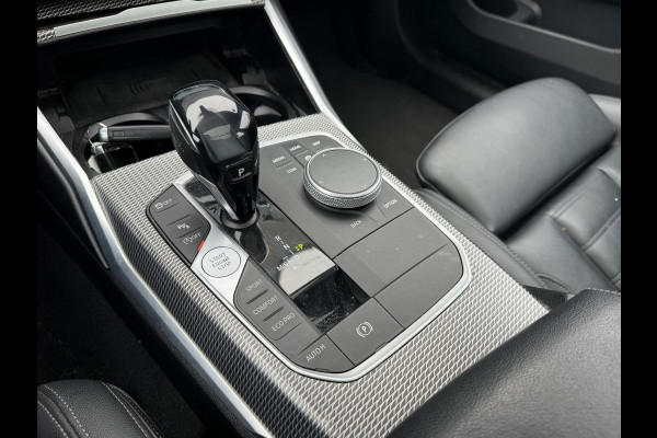 BMW 3 Serie Touring 320i High Executive M-Sport | Panoramadak | Camera | Head-Up Display | DAB |